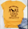 gold tee black text